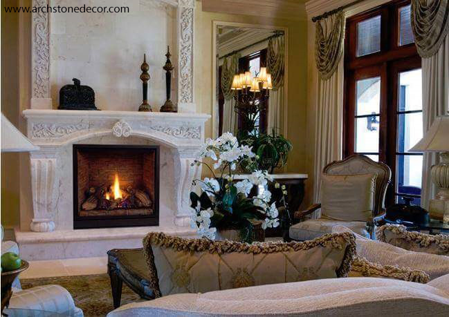 French country interior design home decor living room reclaimed hand carved limestone fireplace mantel overhead