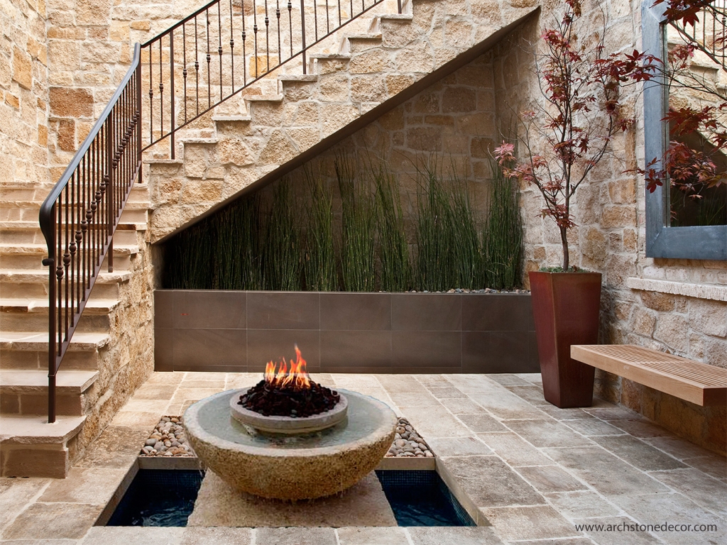 interior design entryway stone basin fire pit with water feature and Barre Gray flooring tiles